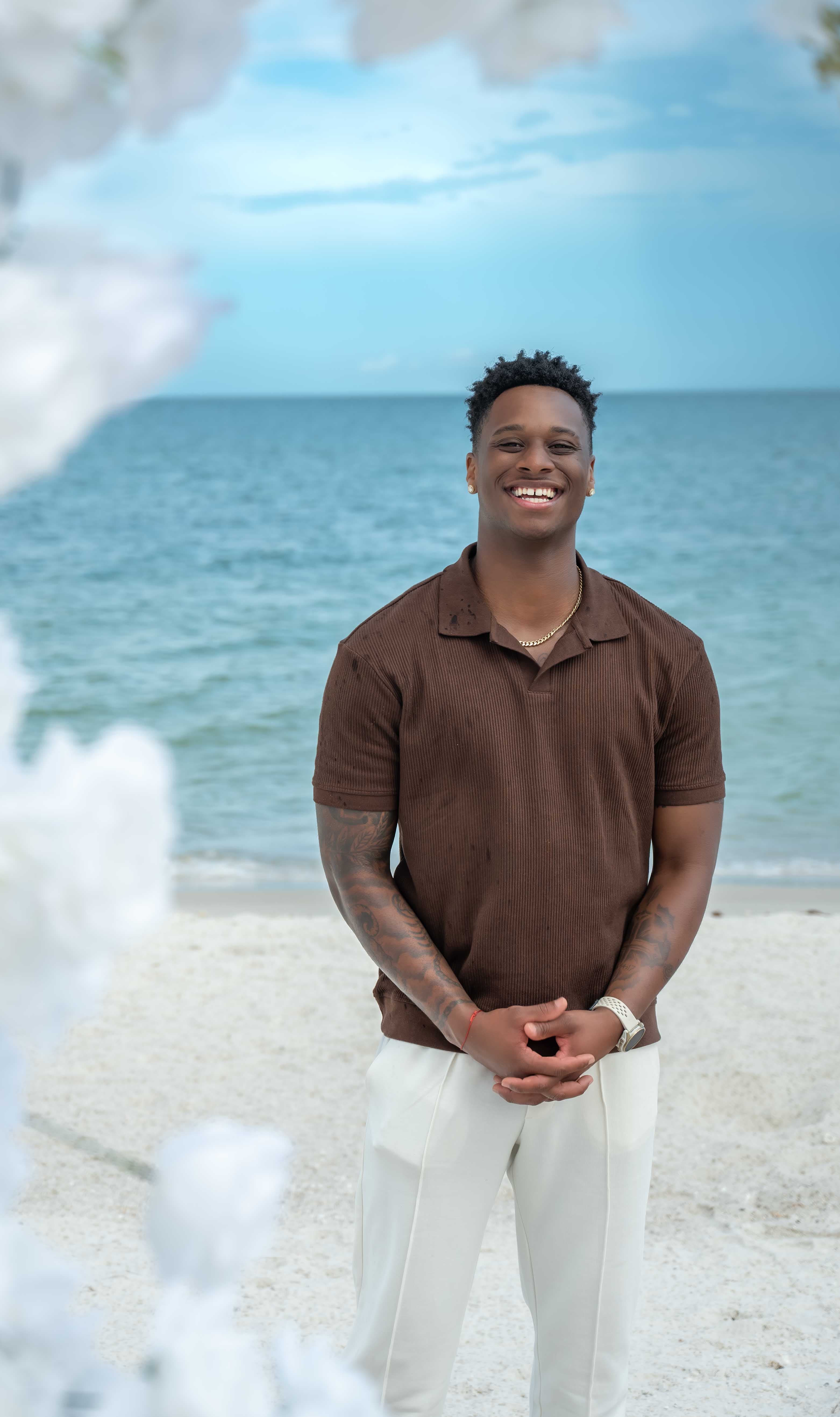Groom portrait on the beach, engagement session