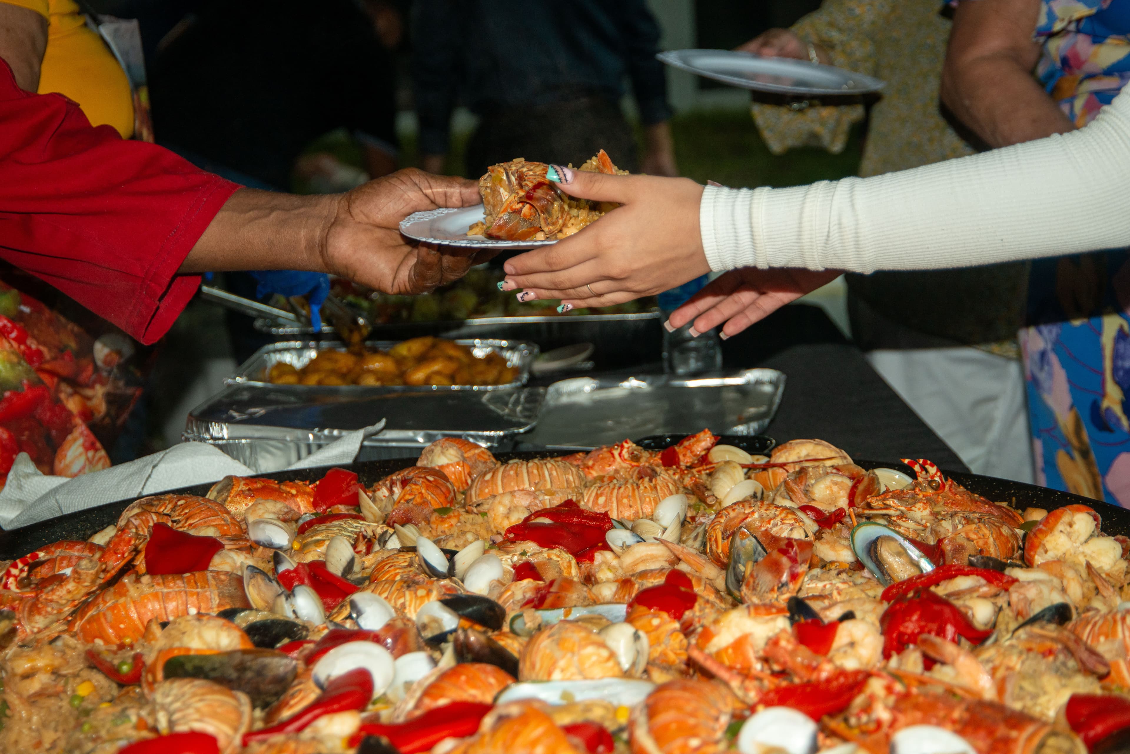 Serving a seafood spread at a Cape Coral, Fort Myers, Bonita Springs and Naples celebration