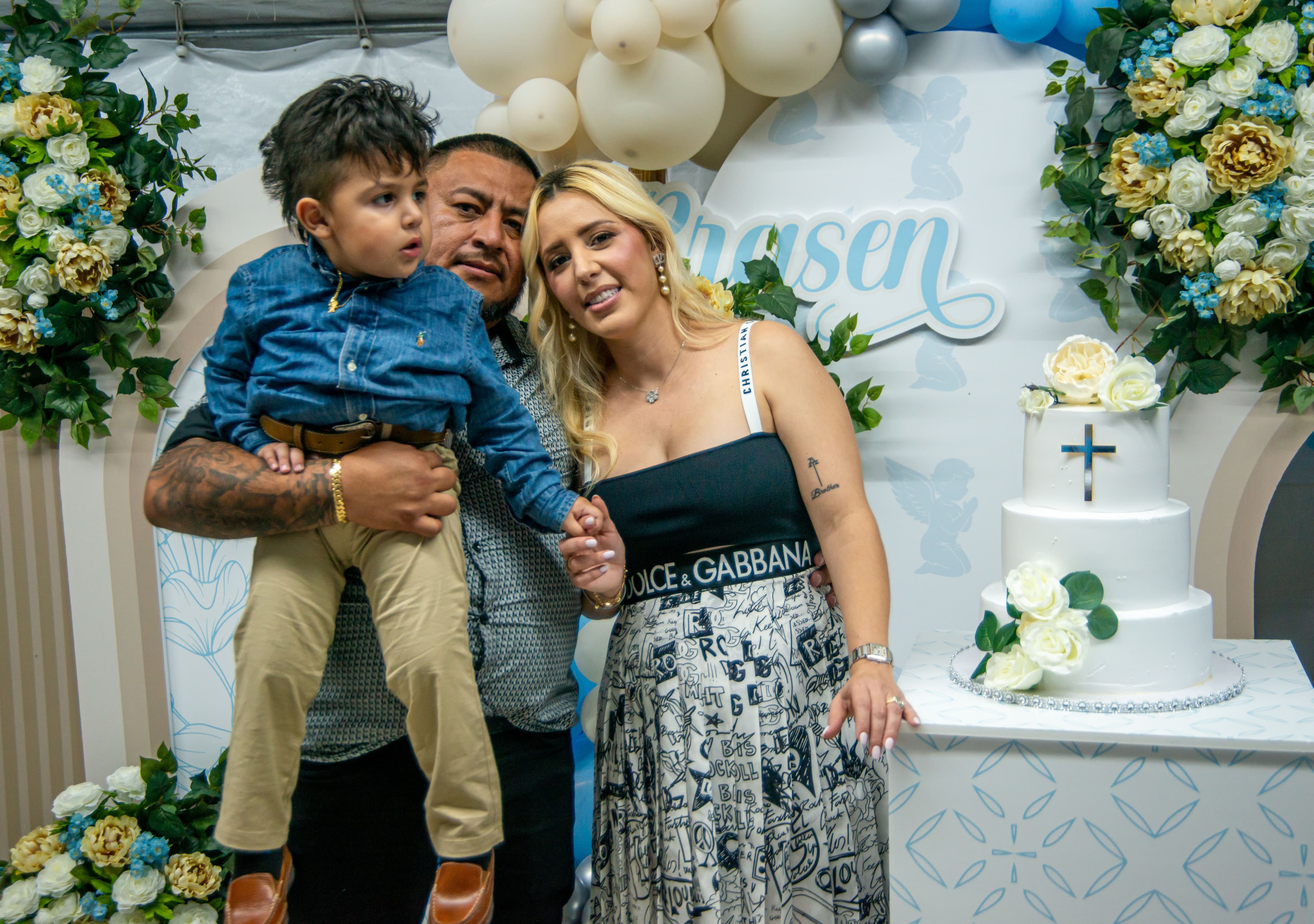 Cutting the ceremony cake at a christening celebration, Cape Coral FL