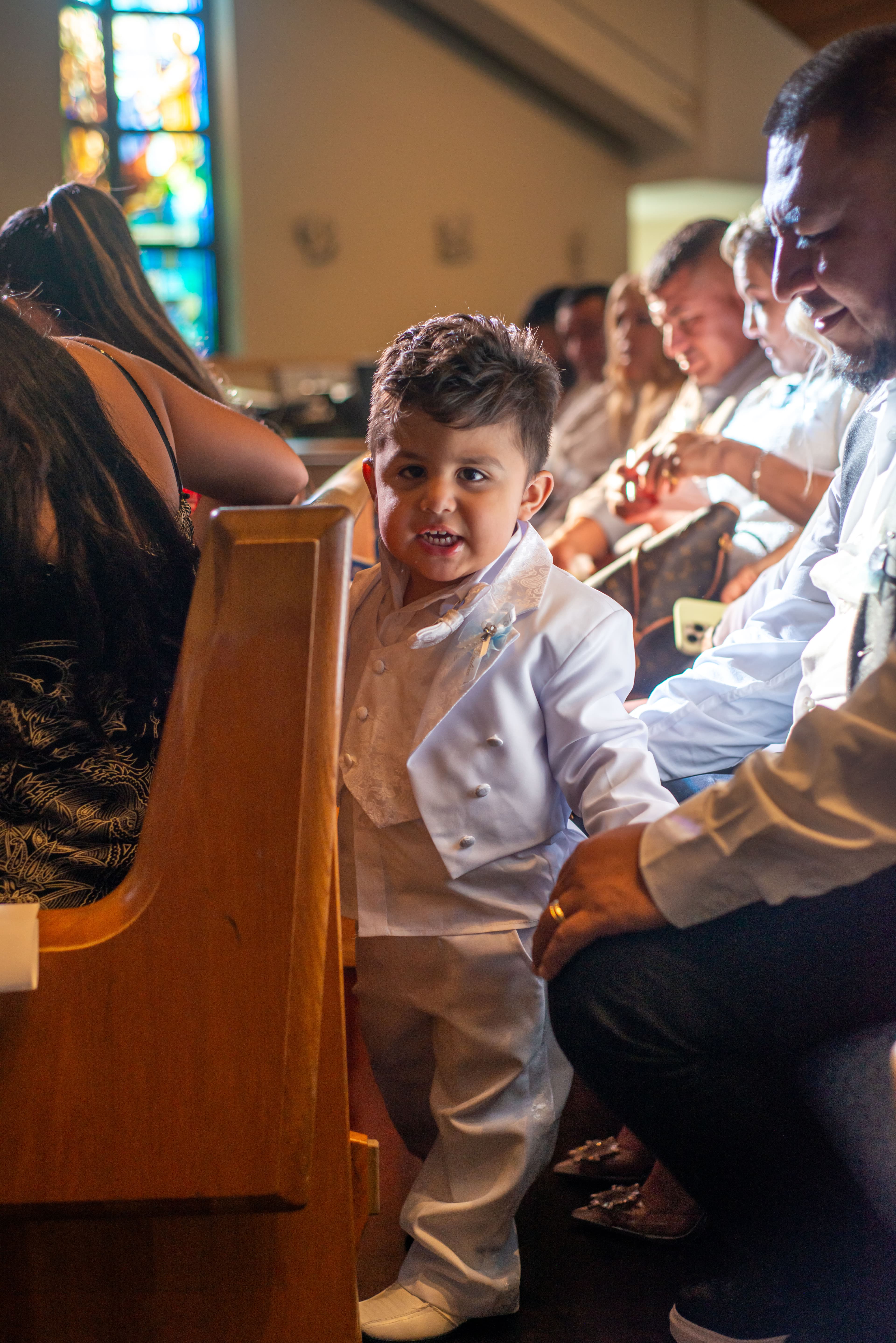 Child smiling during a church ceremony, Cape Coral, Fort Myers, Bonita Springs and Naples