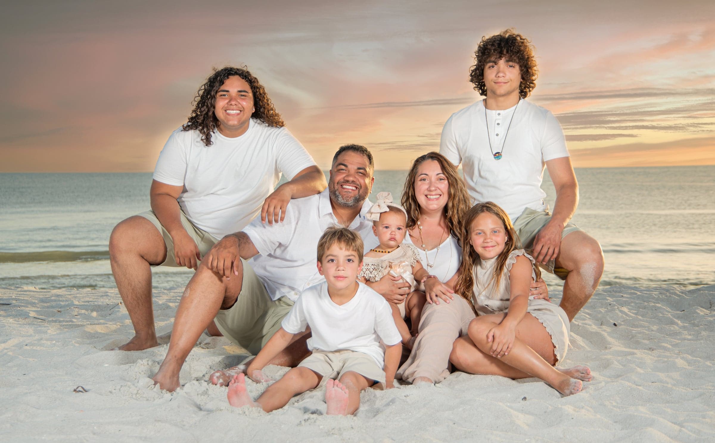 Family portrait at beach, Southwest Florida