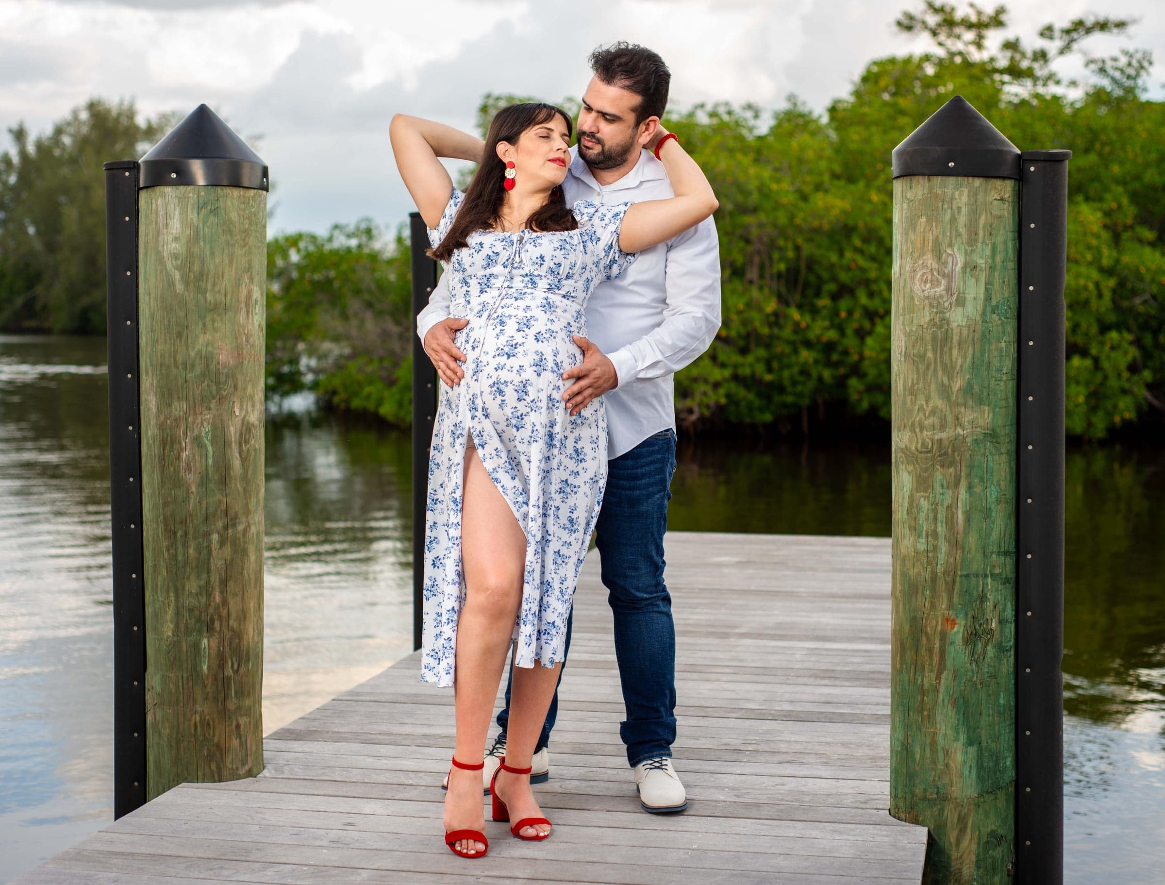 Couple maternity session on dock, Cape Coral waterway