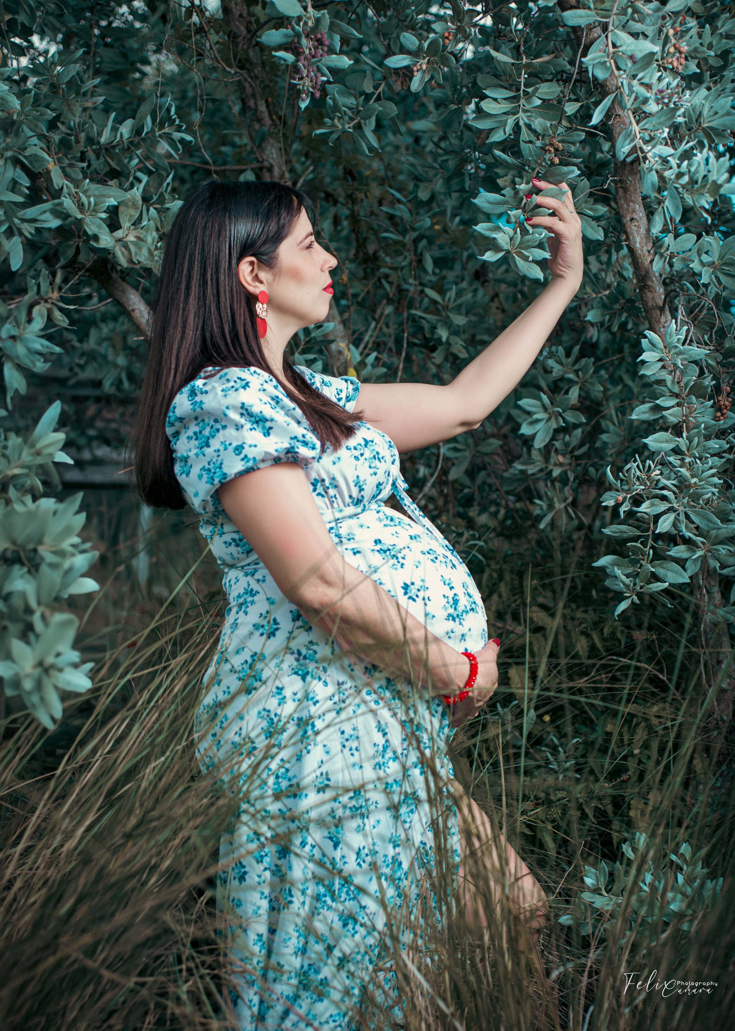 Outdoor maternity portrait in floral dress, Southwest Florida