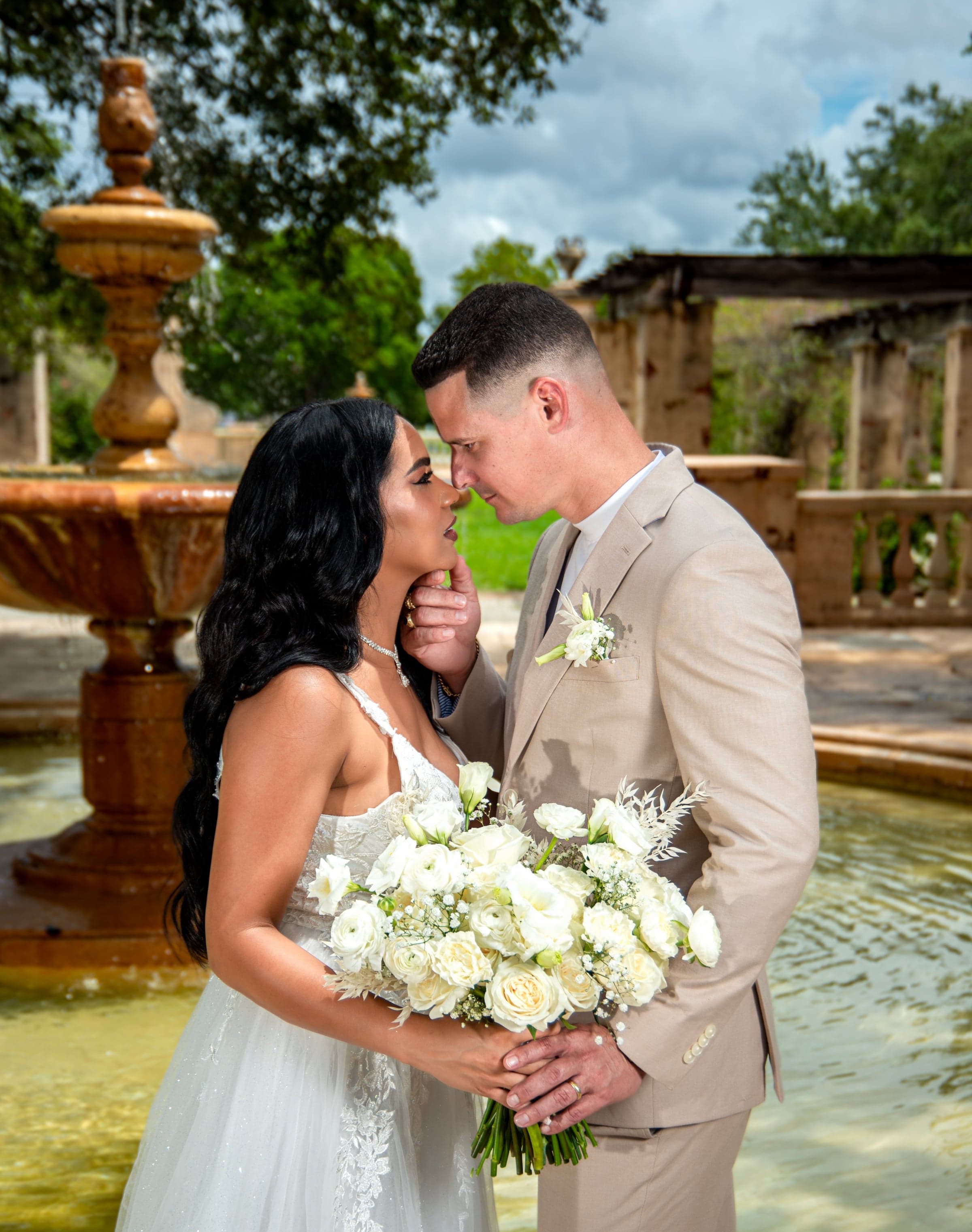Wedding couple at fountain, Southwest Florida