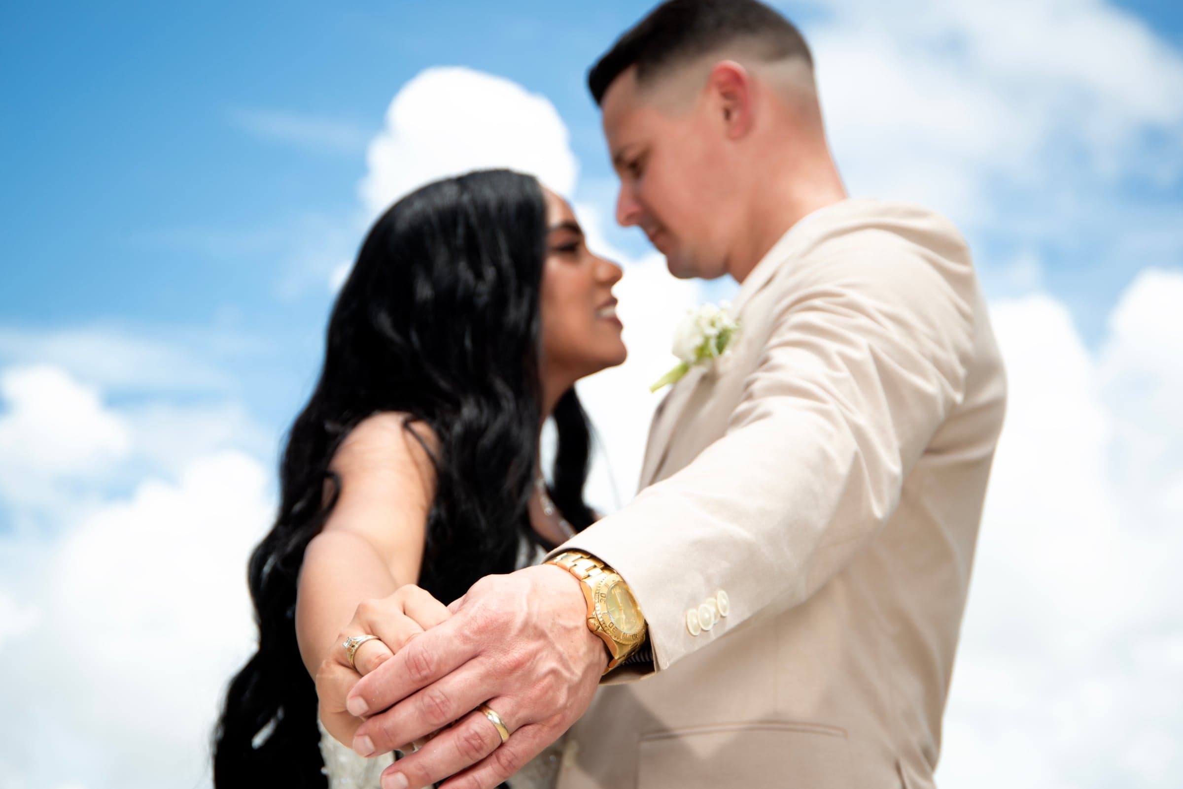 Wedding couple against blue sky, Cape Coral FL