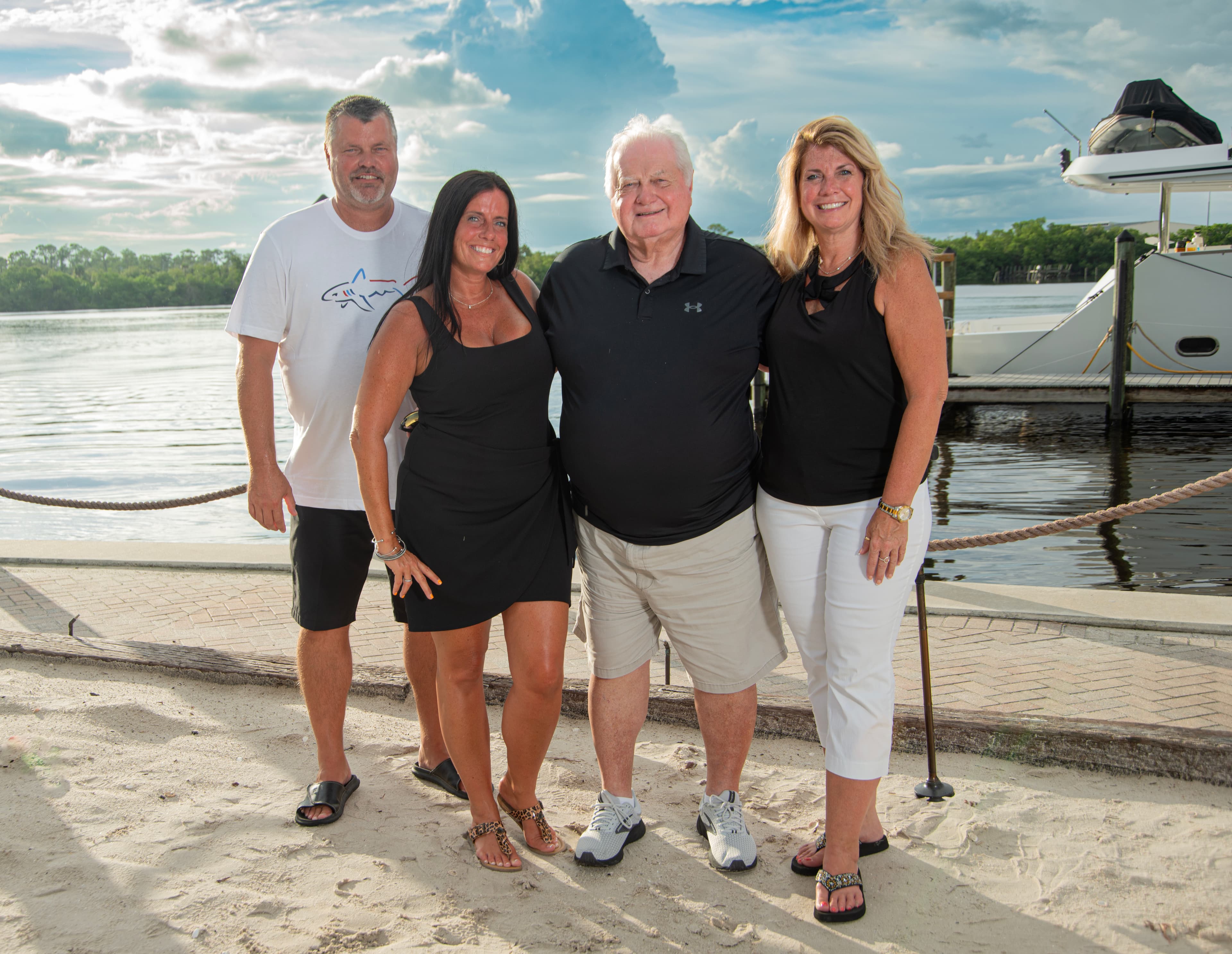 Family candid moment on the dock at golden hour