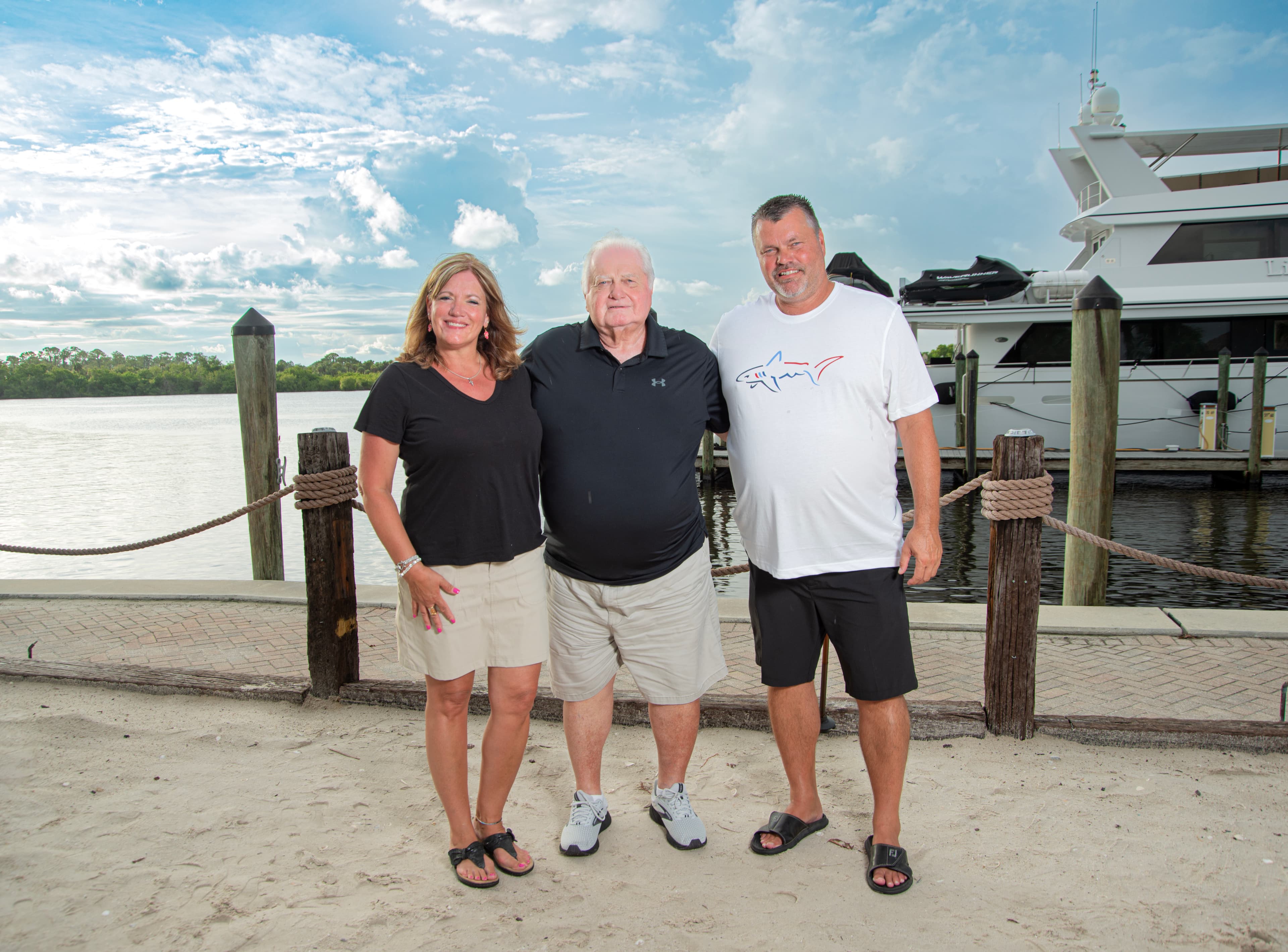 Family candid portrait on the dock