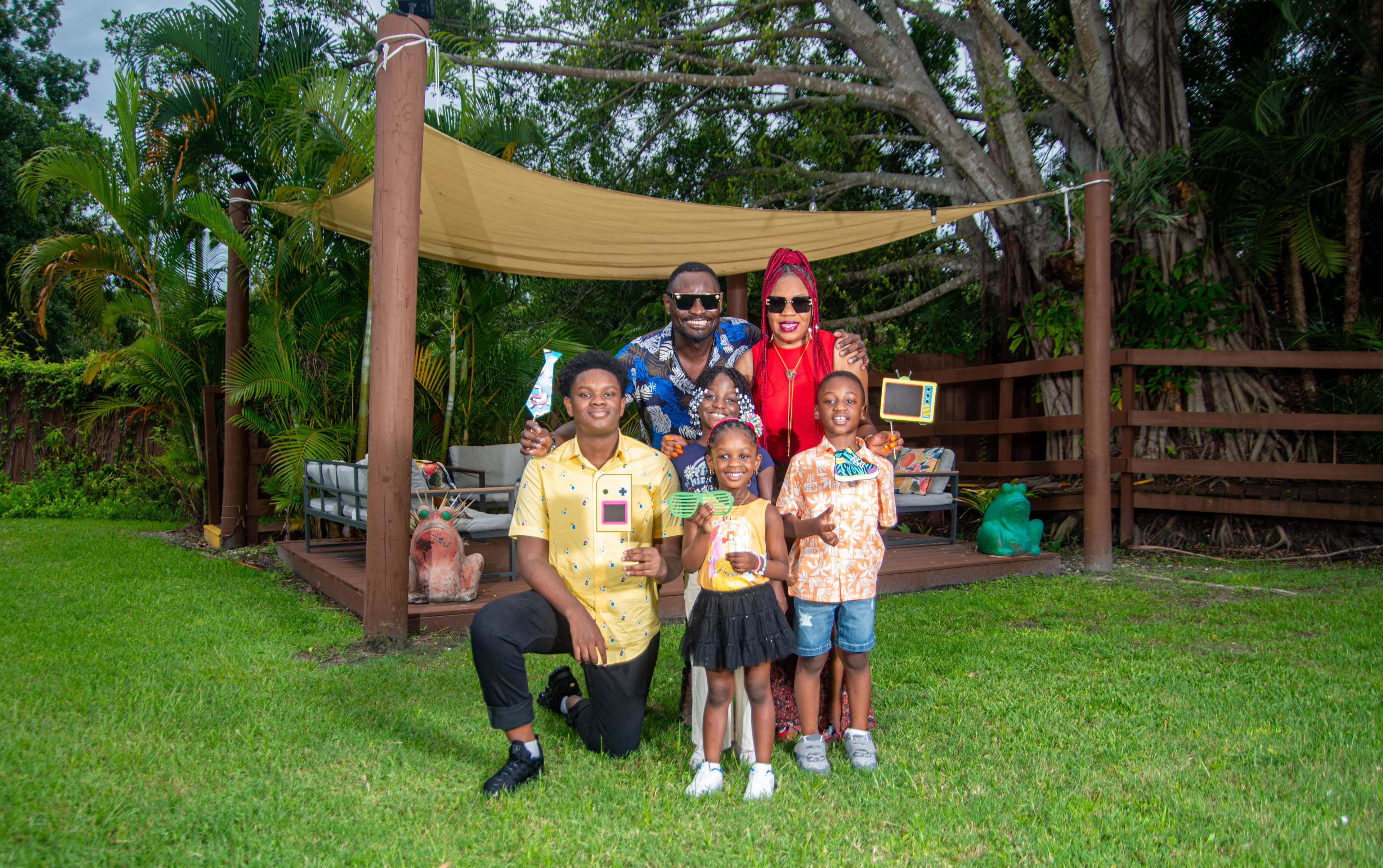 Family portrait among palm trees