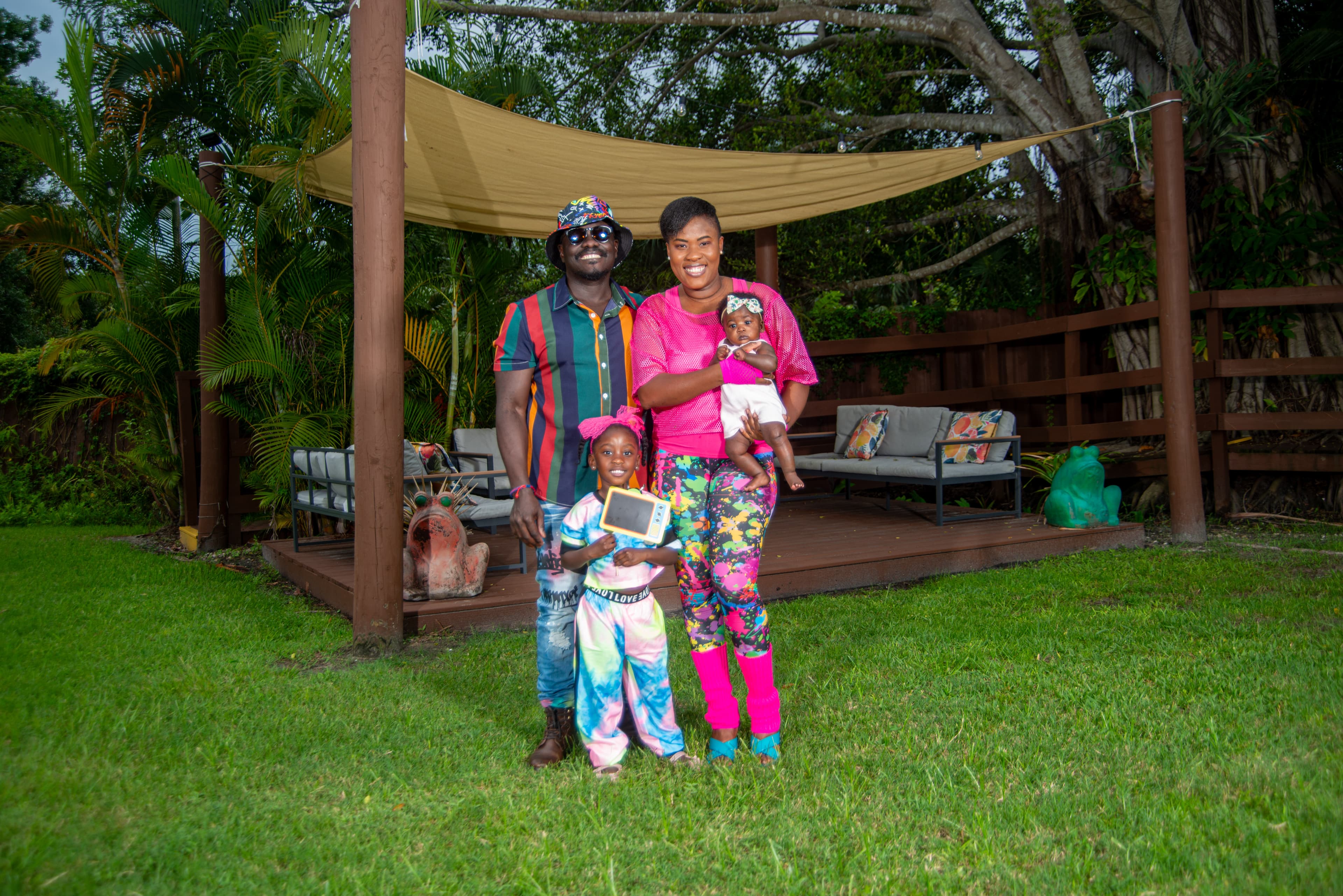 Family portrait on a wooden walkway