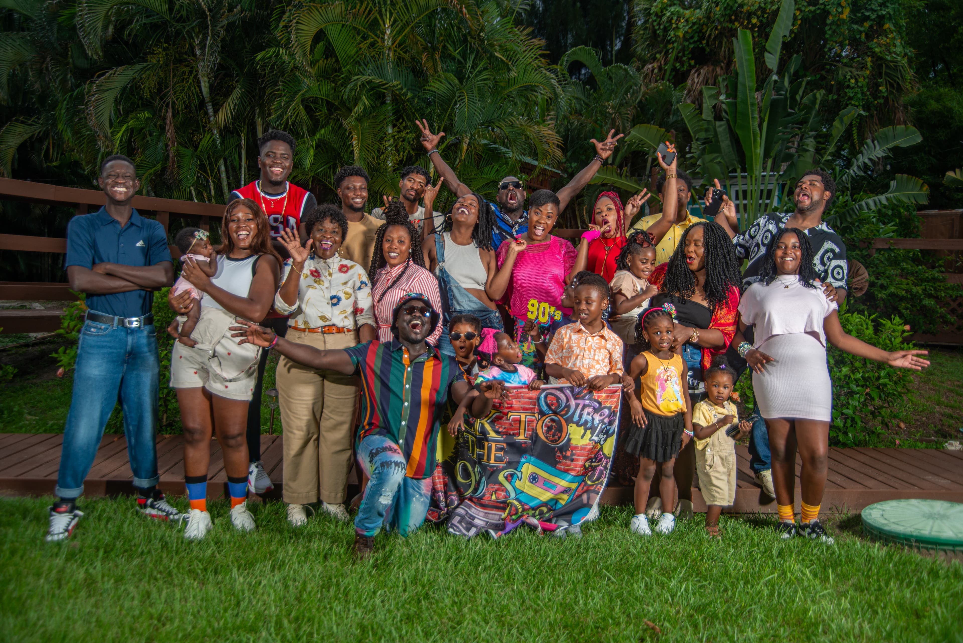 Family group photo outdoors at golden hour
