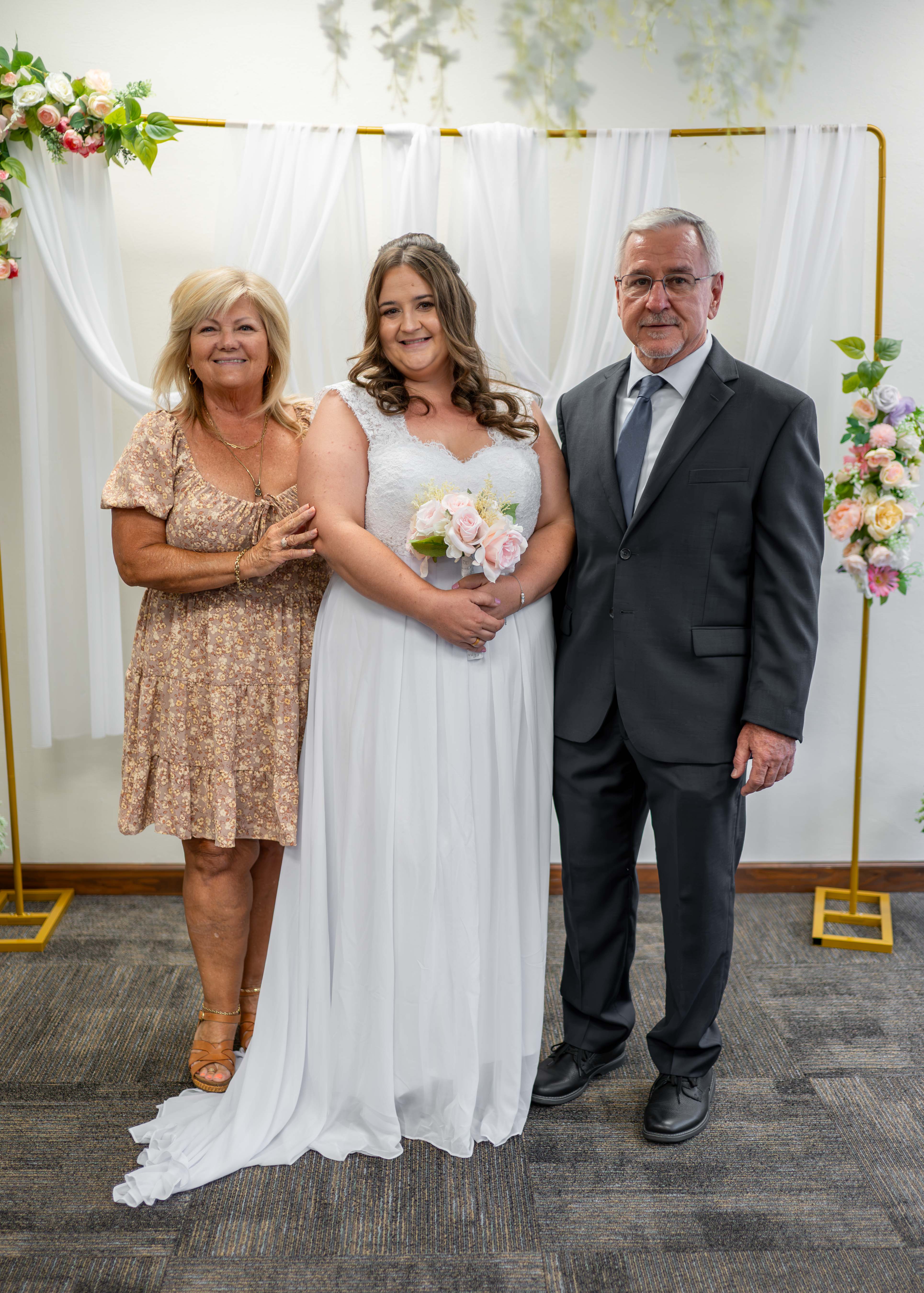Bride and groom embrace, Naples wedding photography